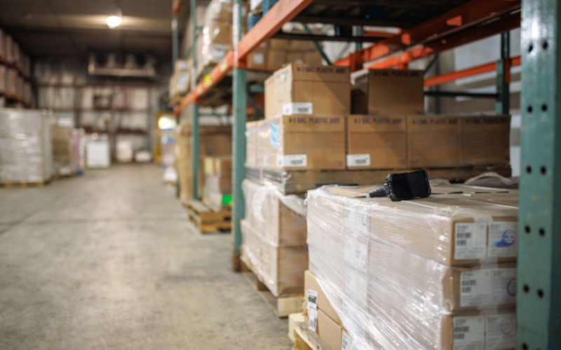 Lost mobile device underneath warehouse racking.